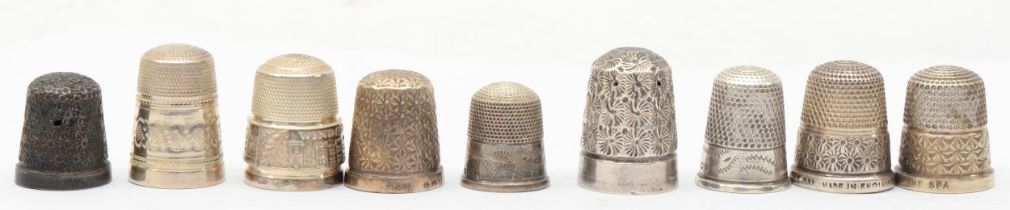 Nine silver thimbles to include a Charles Horner number 6 example, Chester 1894, 41gm.
