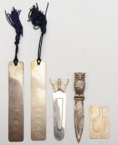 Five silver book marks to include a cast owl example, 9cm, 45gm.