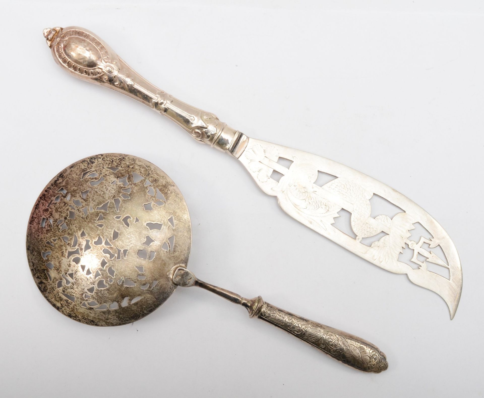An early 20th century Iranian silver server, with pierced floral decoration, stamped control - Image 2 of 2