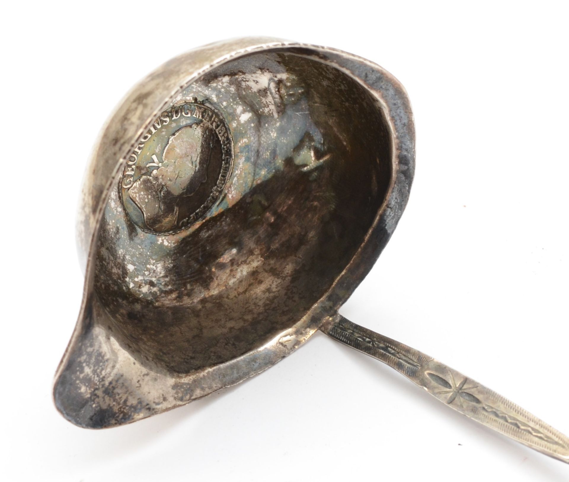 A Georgian silver toddy ladle, with whale bone twist handle and chased decoration, 32.5cm. - Image 2 of 3