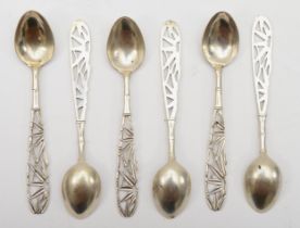 A set of six early 20th century Chinese silver tea spoons, with pierced bamboo decoration, stamped