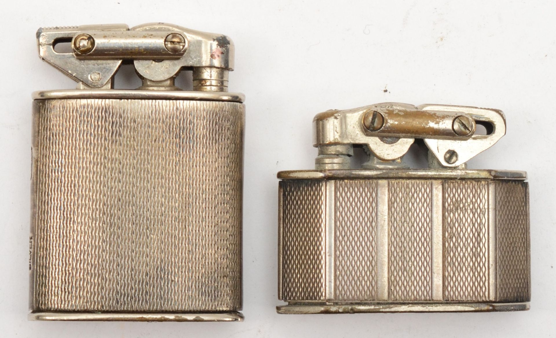 A early 20th century silver cased Elisorn Auto-tank petrol lighter, No 513331, 45mm, together with - Image 2 of 4