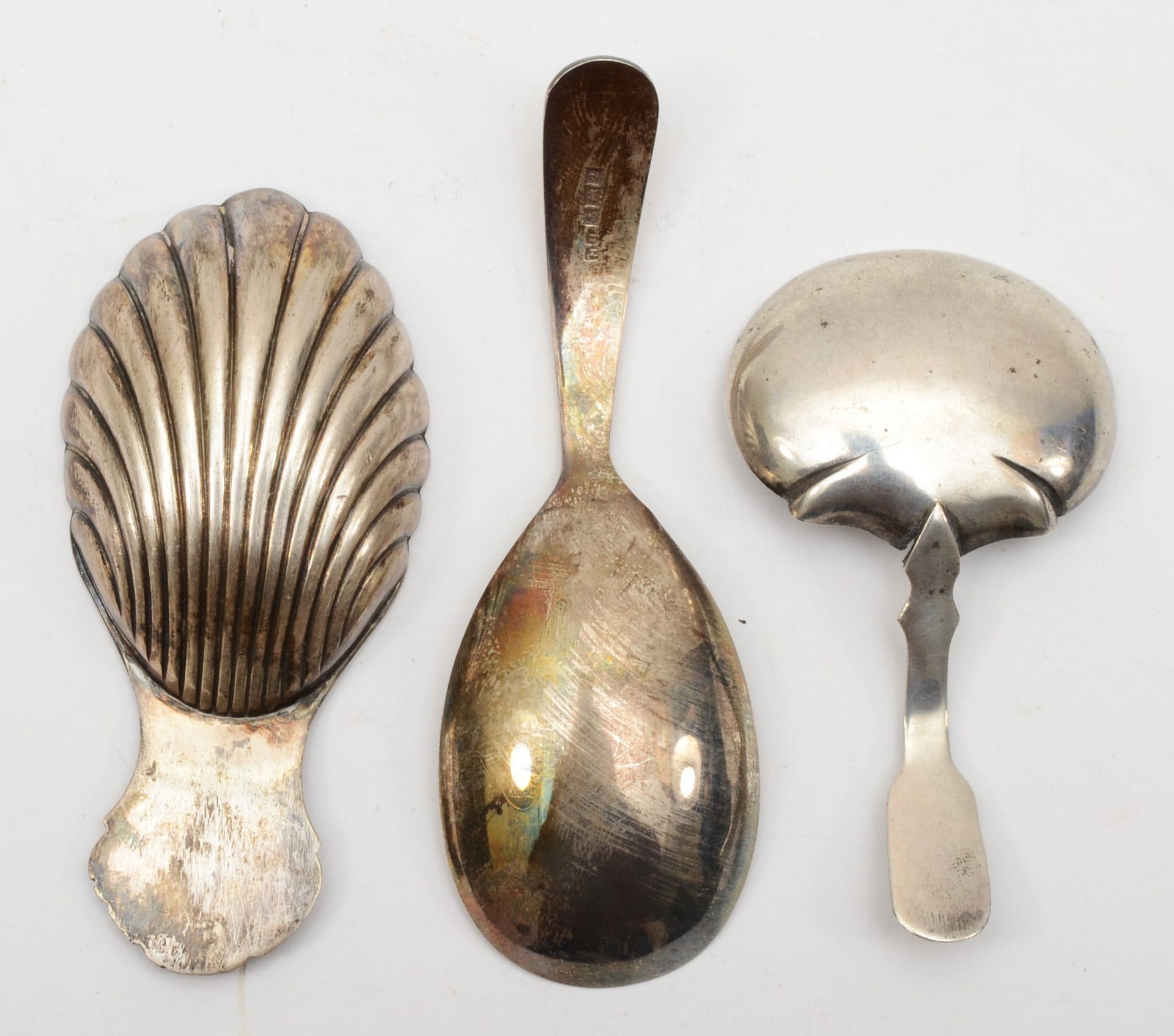 Three silver tea caddy spoons to include a William IV example with thistle decoration, by Joseph - Image 2 of 2