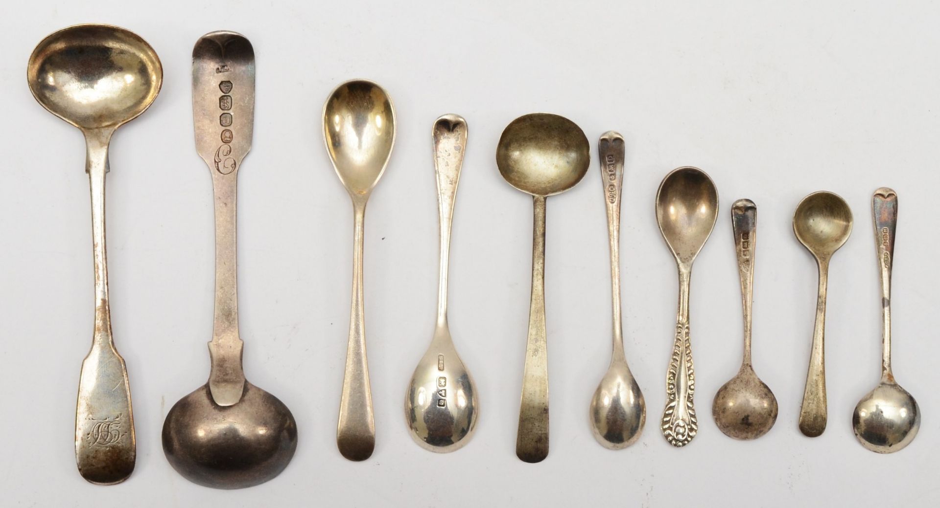 Ten various silver Georgian and later condiment spoons to include a Joseph Fulton spoon, Exeter