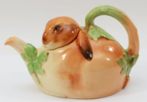 Royal Doulton Bunnykins; a 1930s teapot designed by Charles Noke, modelled as lop eared rabbit, 19cm