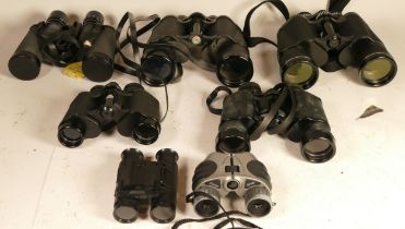 Seven cased pairs of binoculars to include Prinz 10x50, Prinxlux 10x50 and Hanimex 8x30 (7)