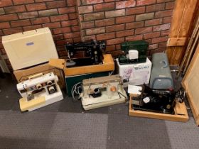 Five assorted cased sewing machines to include Singer and Frister & Rossman (5)