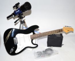 A modern 'Power Play' full size Strat style guitar with amplifier and accessories, boxed as new,