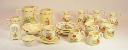 Royal Doulton Bunnykins; to include bowls, jugs, mugs and a clock