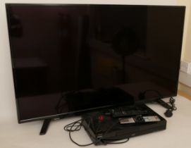 A Toshiba LCD 49inch Smart TV, model 49U2963DB, together with a Sony DVD recorder, RDR-DC100, with