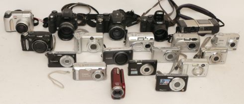 Assorted contemporary digital cameras to include Canon, Olympus and Nikon