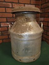 A 20th century galvanized metal twin handled milk churn, 48cm high.