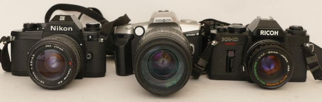 Three cameras comprising of Nikon EM with Tokina 28-70mm 1:3.5-4.5 lens, Ricoh KR-10 Super