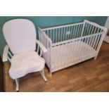 A modern child's cot, 124cm long together with a white painted spoon back rocking chair (2)