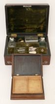 A Victorian mahogany vanity box, inlaid with mother of pearl, the hinged lid with green velvet