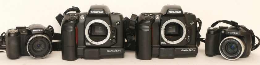 Four assorted Fujifilm cameras comprising of a FinePix S5700 with f=6.3 63mm lens, a Fujifilm