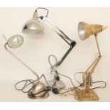 An early 20th century anglepoise table lamp, together with two modern examples. (3)