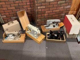 Four assorted cased sewing machines to include Singer and LMR Seamstress (4)