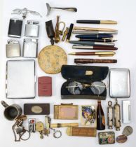 A quantity of collectables to include, fountain pens, cigarette lighters/cases, lapel badges, a LNER