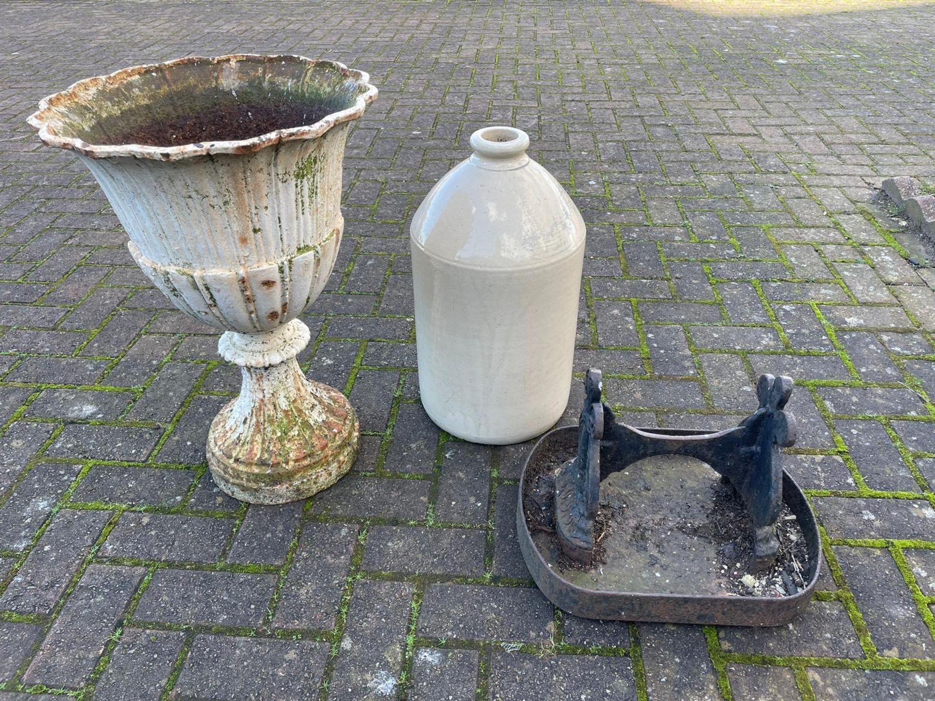 A Victorian white painted cast metal planter, 62cm, a cast iron boot scraper and a late Victorian