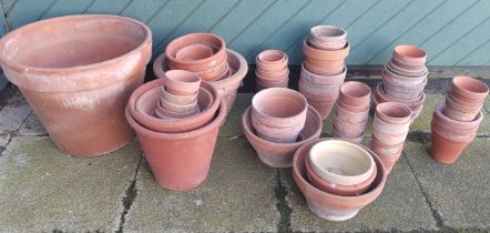 An assortment of 20th century terracotta garden plant pots
