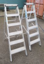 A Youngman five height folding aluminum step ladder, together with a Wickes five height folding step