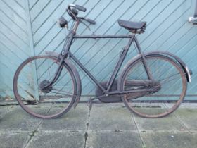 An early 20th century gents Raleigh bicycle, together with a later gents bicycle manufactured by