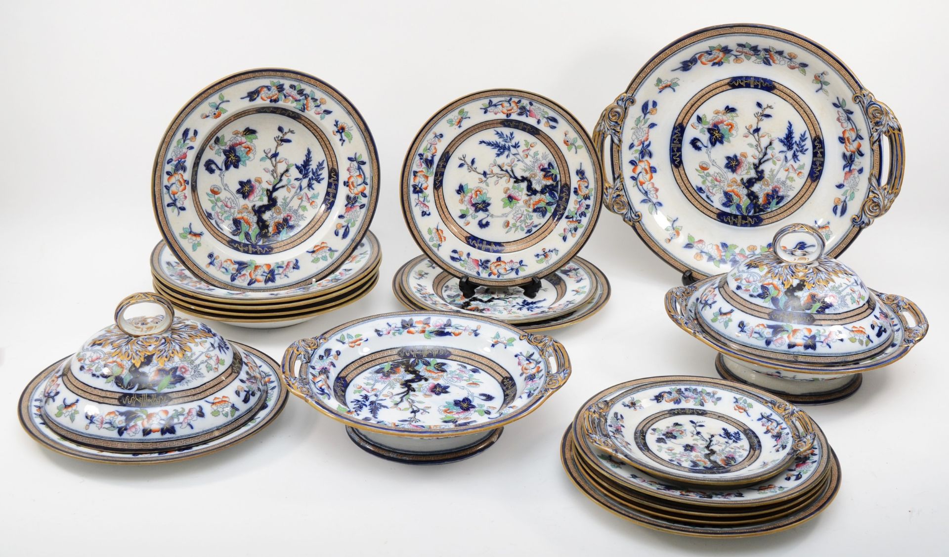 A 19th century Pinder, Bourne & Hope 'Dresden' pattern glazed earthenware pattern part dinner set