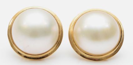 A pair of 375 gold mounted mabe pearl ear studs, 15mm