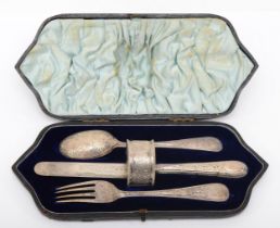 A Victorian silver four piece christening set, London 1895, (knife handle Sheffield 1895), with