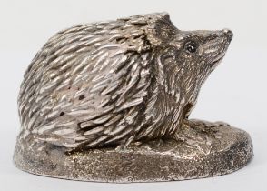 A silver hedgehog paperweight, by Country Artists, Birmingham 1994, loaded, 7 x 4.5cm.