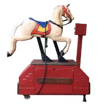 A coin operated painted and cast alloy horse ride, 115 x 53 x 132cm. Provenance; Watermouth