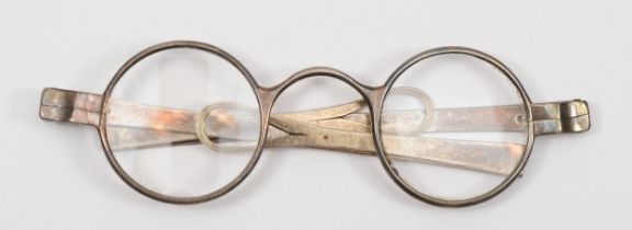 A Georgian silver pair of spectacles, lion passant three times and engraved T.W twice, with