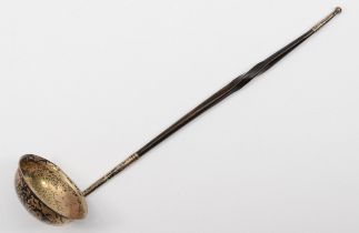 A Georgian silver toddy ladle, unmarked, with whale bone twist handle, 21cm, 20gm.