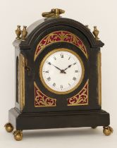 John Walker, an ebonised dome topped mantle clock, the white dial with black Roman numerals,