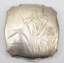 A Japanese 950 silver rounded rectangular compact and mirror, with chased flowers and dragonfly