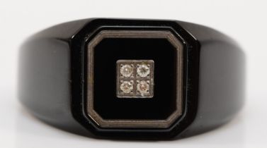 Ken-Terry; a contemporary blackened stainless steel gentleman's ring, with onyx panel set with