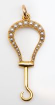 A Victorian unmarked 15ct gold and half pearl folding button hook chatelaine attachment, length open