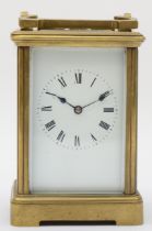 A 20th century brass corniche cased striking mantle clock, striking on the hour and half hour,