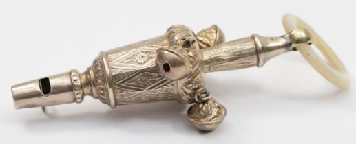 A Victorian silver and mother of pearl rattle, no maker, Birmingham 1872, with floral embossed