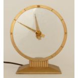 Jefferson Golden Hour electric mystery clock, with brushed brass hands, bezel and base and glass