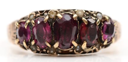 A Victorian gold five stone almandine garnet and seed pearl dress ring, M, replacement shank,