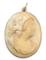 A Victorian low carat gold mounted lava cameo pendant, carved to a Bacchante, plain mount, 30 x 24mm