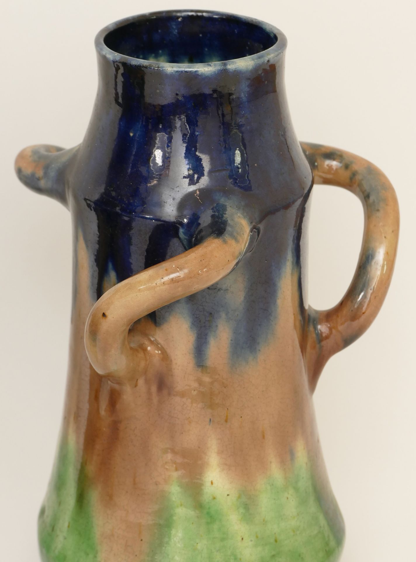 A pair of early 20th century possibly Belgian drip glaze vases in blue, brown and green with three - Image 2 of 4