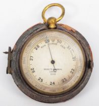 Negretti & Zambra, an early 20th century gilt metal cased pocket barometer, the silvered marked with