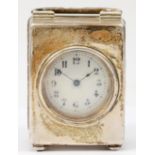 A Victorian silver miniature clock, London 1898, in plain case, raised on four ball feet, C scroll