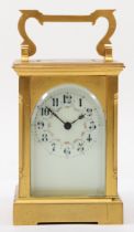 A 20th century French brass corniche cased carriage clock, with hourly striking movement, the