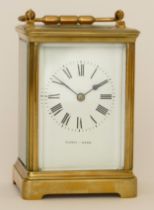 Mappin & Webb; a 20th century brass corniche cased hourly striking carriage clock, strikes on a