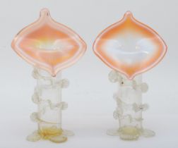 A pair of Victorian glass Jack in the Pulpit vases, with applied decoration, each raised on four