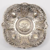 A German 800 standard silver embossed and pierced dish, crescent and 800 , with central courting